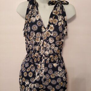 Jumpsuit Light weight, shoulder adjustable strap 65% Silk 35% polyester Size M.